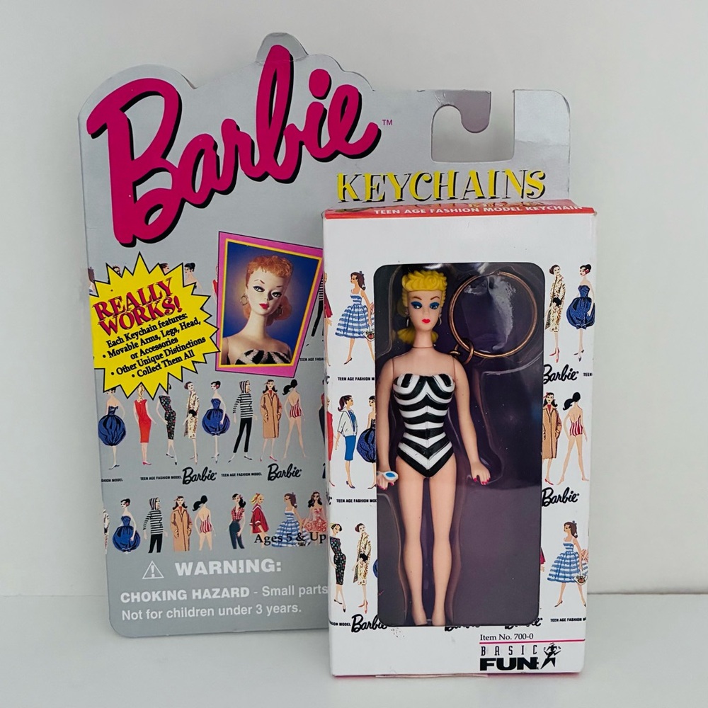 NWT BARBIE Blonde 1959 Black White Swimsuit Key Chain
Moveable Head Arms Legs